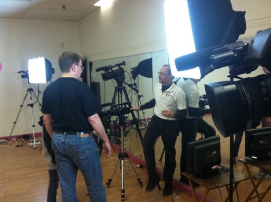 Executive Producer, Peter Stassa, and crew on set of a training video for Hydro Family Fitness